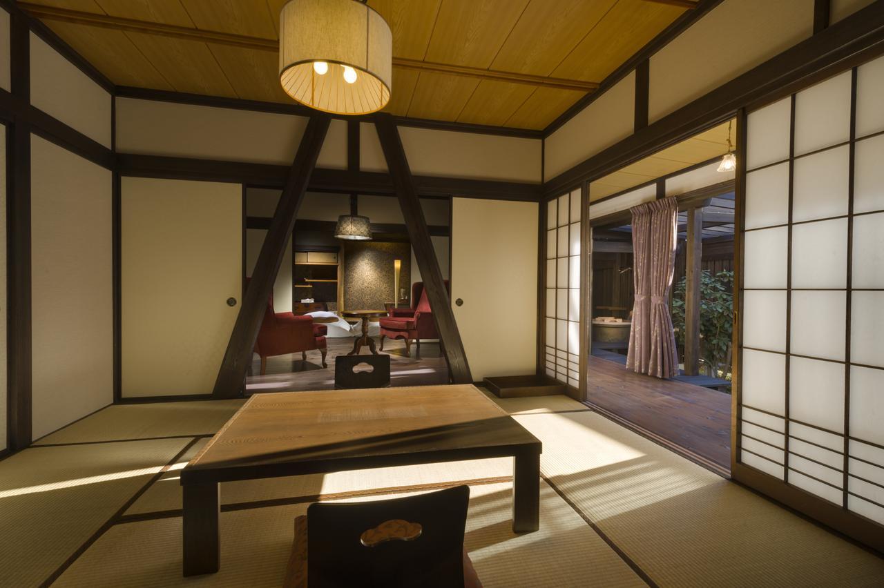 Kurotake Hotel Achi Exterior photo